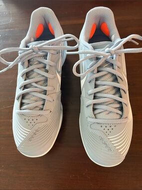 Girls Softball Athletic cleats Gray with Orange Accents